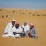 a_m_with_camel_jockeys_saudi_desert.jpg