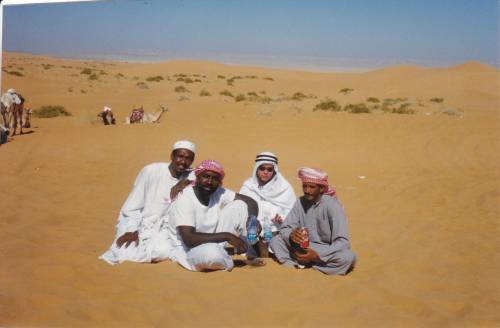 a_m_with_camel_jockeys_saudi_desert.jpg