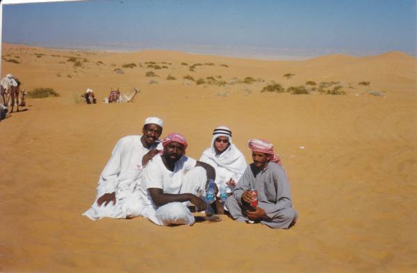 a_m_with_camel_jockeys_saudi_desert.jpg